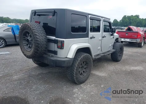 2007 Jeep Wrangler Unlimited Sahara from USA, damaged, VIN 1J4GA59127L211076